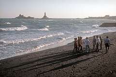 View from the Vivekananda Kendra (Ashram) across the beach to the Vivekananda Memorial and the Thiruvalluvar Statue on two rocky islands, just offshore Kanniyakumari.