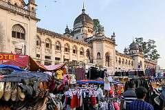 Traders in front of the Government Nizamia General Hospital (General Unani Hospital), built in 1926 by His Exalted Highness Mir Osman Ali Khan, the last Nizam of Hyderabad, just south of Charminar.
