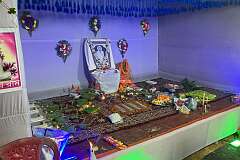 The altar with the photo of a recently deceased guru, in whose  honour a Hindu “puja” is performed in Agartala.