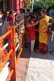 A woman ringing bells outside the Tripura Sundari Mandir in Udaipur, one of the state’s most sacred pilgrimage sites.