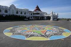 The picturesque Udaipur Railway Station with its ground painting.