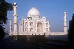 The Taj Mahal ('Crown of the Palace'), a marble mausoleum on the right bank of the river Yamuna in Agra, commissioned in 1631 by the fifth Mughal emperor, Shah Jahan, to house the tomb of his beloved wife, Mumtaz Mahal.
