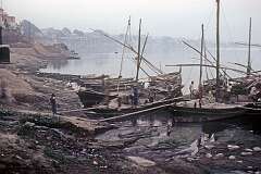 Workers on boats on the banks of the Ganges river in Varanasi.