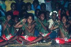Boys performing a “sit-down” dance at a school party in Tabwiroa.