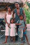 Marlyna and Snappy Arawatau with their children Rita and Frenny in front of their house in Tuarabu.