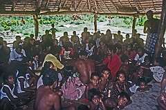 The men singing in the Maneaba “Te Aake”, the meeting house in the village of Ukiangang.