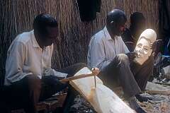 Wood carvers in the “Matabele village” of Victoria Falls.