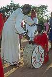 A young drummer receives a blessing.