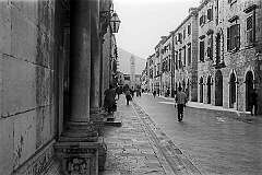 Dubrovnik, Croatia - The Stradun (or Placa), thoroughfare in the Old Town, with the 15th century clock tower in Luža Square.