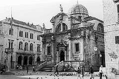 Dubrovnik, Croatia - The Baroque Church of Saint Blaise in Luža Square, with the Rector’s Palace of the Republic of Ragusa.