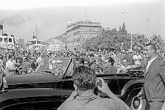 Split, Croatia - Yugoslav president Josip Broz Tito and his wife Jovanka driving off in an open Rolls Royce.